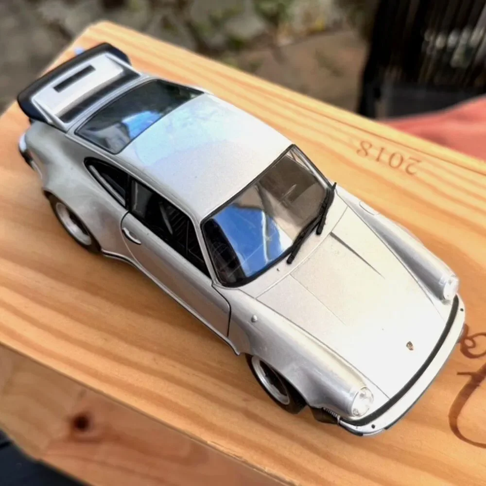 2018 Welly Porsche Silver 1974 911 Turbo Coupe #24043 Diecast Model Car